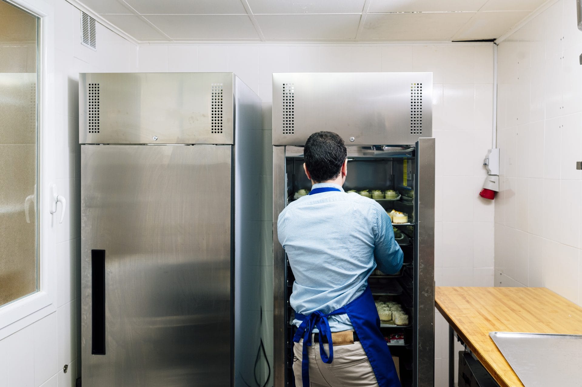 chef-organizing-desserts-in-commercial-refrigerato-2026-09-23-18-12-11-utc