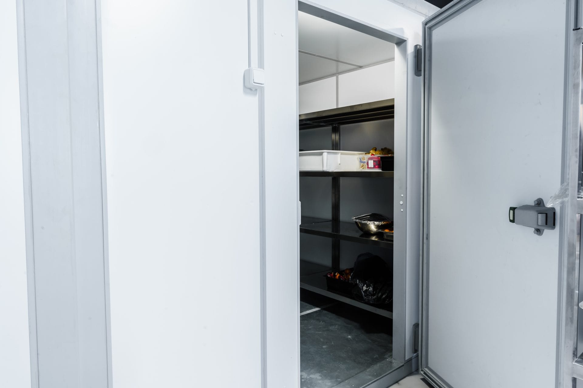 interior-of-an-open-white-refrigerator-in-a-workpl-2026-09-23-20-29-31-utc